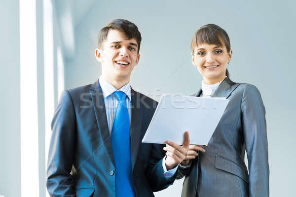 two business partners discussing reports Stock photo © adam121