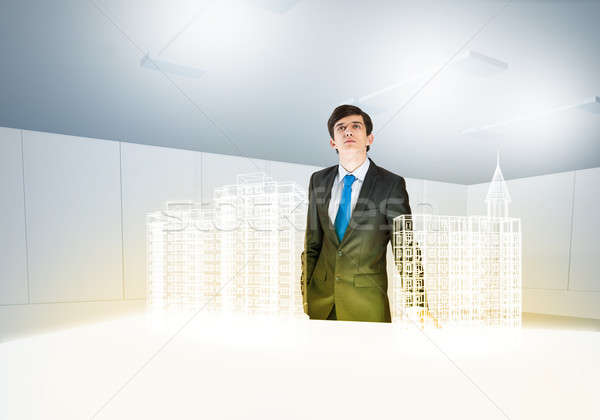 Om arhitect tineri om de afaceri digital model Imagine de stoc © adam121