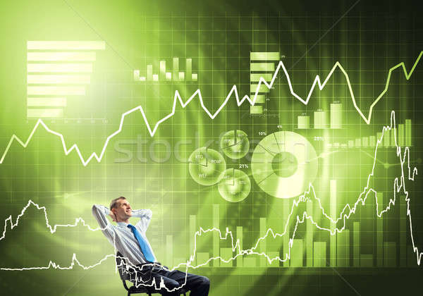 Relaxed businessman in chair Stock photo © adam121