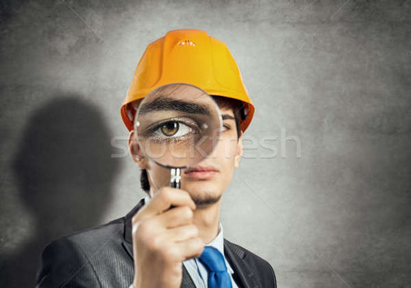 építkezés férfi nagyító portré mérnök sisak Stock fotó © adam121