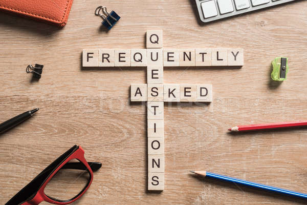 Frequently Asked Questions concept collected of wooden cubes on business workplace Stock photo © adam121
