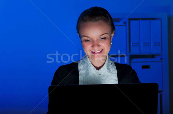 portrait of a woman in a night office Stock photo © adam121