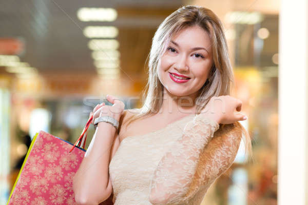 portrait of a beautiful woman in a shopping center Stock photo © adam121