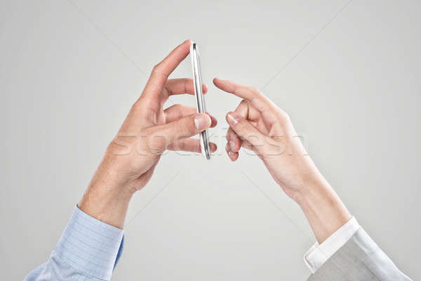 Werken cohesie zakenlieden handen mobiele telefoon Stockfoto © adam121