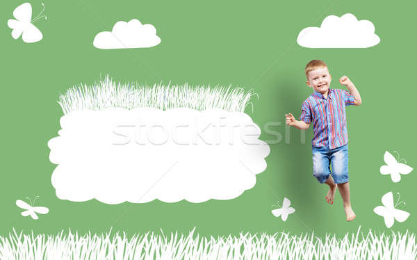 Chłopca skoki malowany ściany trawy chmury Zdjęcia stock © adam121