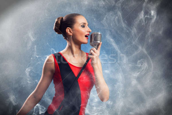 красивой певицы микрофона вокруг Сток-фото © adam121