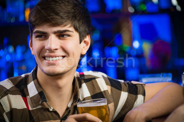 portrait of a young man at the bar Stock photo © adam121