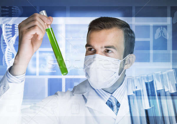 Portrait of concentrated male scientist working with reagents in laboratory Stock photo © adam121