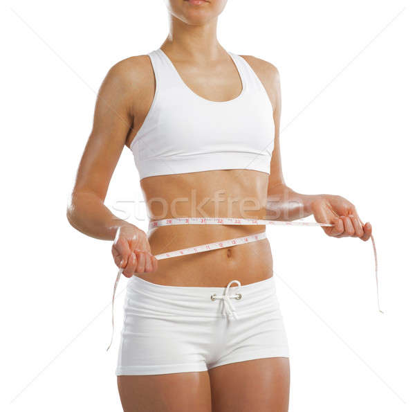 [[stock_photo]]: Jeunes · athlétique · femme · taille · mètre · à · ruban