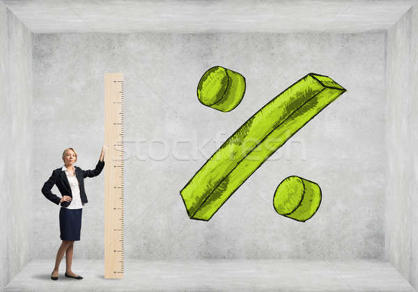 Businesswoman with wooden ruler Stock photo © adam121