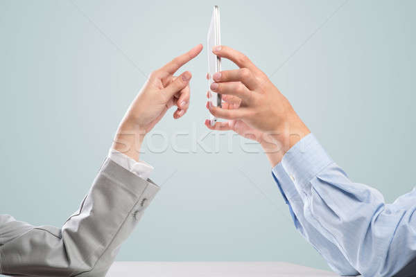Werken cohesie zakenlieden handen mobiele telefoon Stockfoto © adam121
