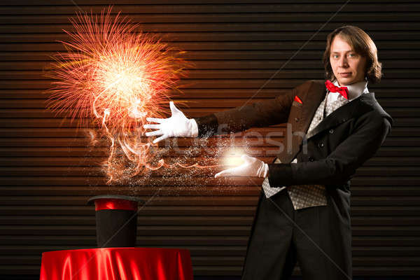 magician causes the magic out of the hat Stock photo © adam121