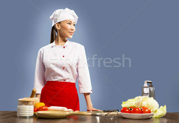 Asian vrouwelijke chef naar ruimte tekst Stockfoto © adam121