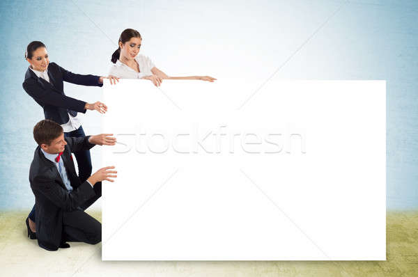 small group of people holding a blank banner Stock photo © adam121