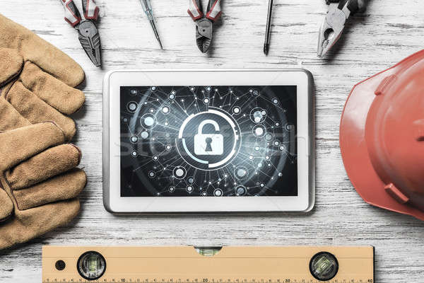 Stock photo: Web security and technology concept with tablet pc on wooden tab