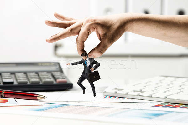 Hand catching man Stock photo © adam121