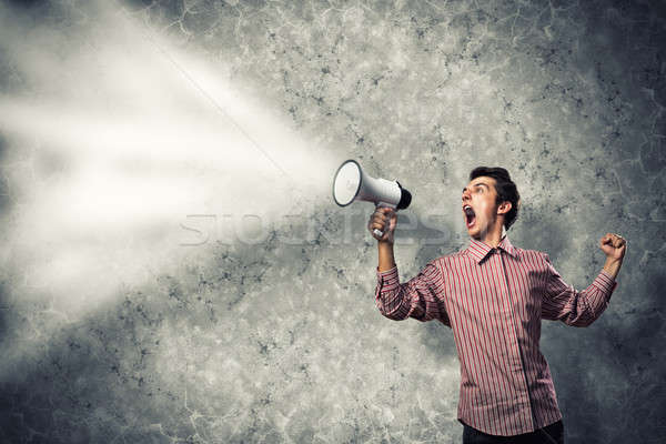 man yells into a megaphone Stock photo © adam121