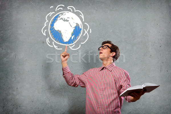 young man with a book thinks Stock photo © adam121