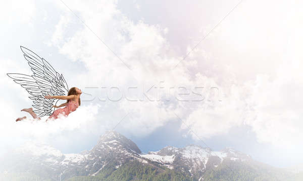 Fiatal szabad fiatal nő repülés magas kék ég Stock fotó © adam121