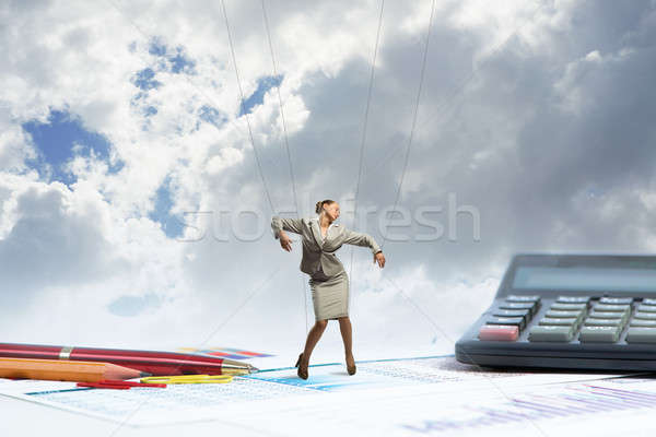 businesswoman puppet doll is on the desk Stock photo © adam121