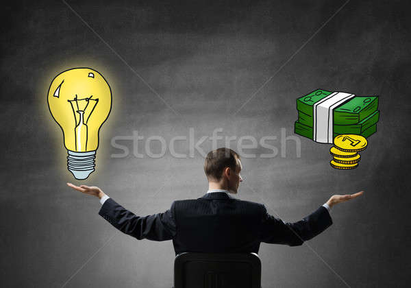 Businessman thinking over his investments Stock photo © adam121