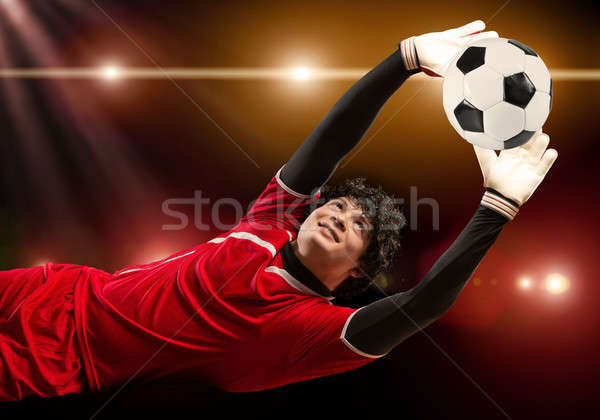 O melhor goleiro retrato saltar grama homem Foto stock © adam121