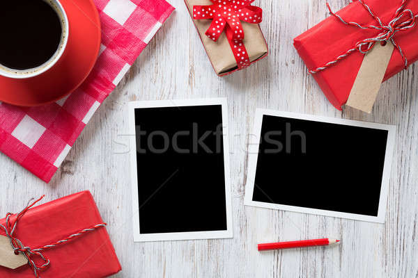 Stock photo: Blank photo frames on table