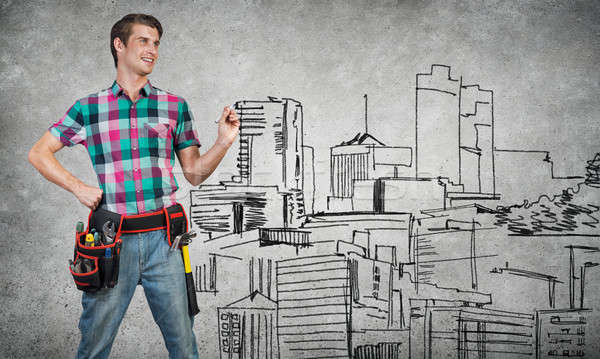 Guy engineer sketching his ideas Stock photo © adam121