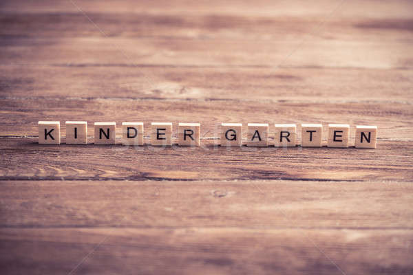 wooden elements with letter collected to word kinder garten Stock photo © adam121