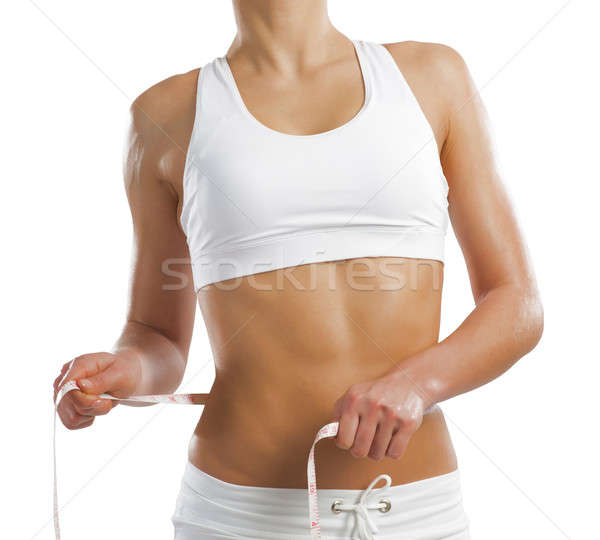 young athletic woman measuring waist Stock photo © adam121