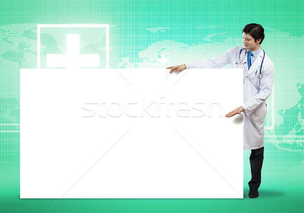 Doctor with banner Stock photo © adam121