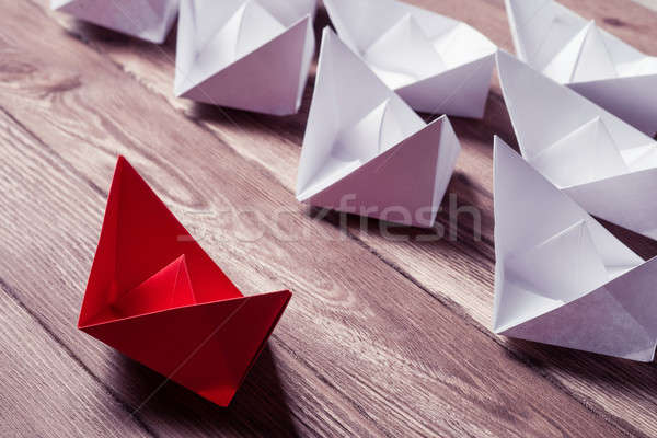 Business leadership concept with white and color paper boats on  Stock photo © adam121