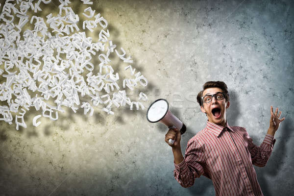 man yells into a megaphone Stock photo © adam121