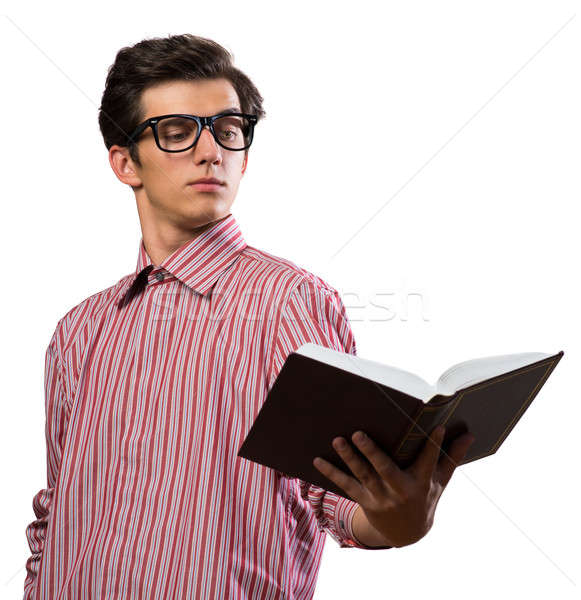 Joven lectura libro gafas sorprendido papel Foto stock © adam121