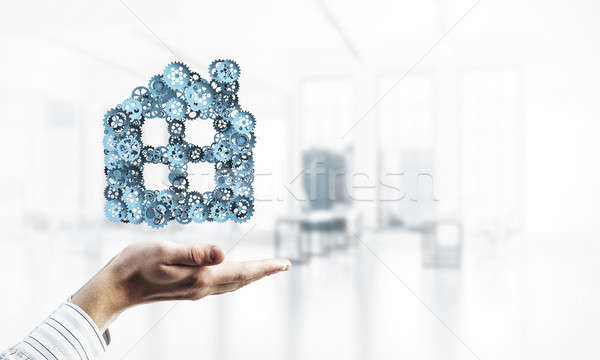 Symbol of homepage or accomodation made with cogwheels presented Stock photo © adam121