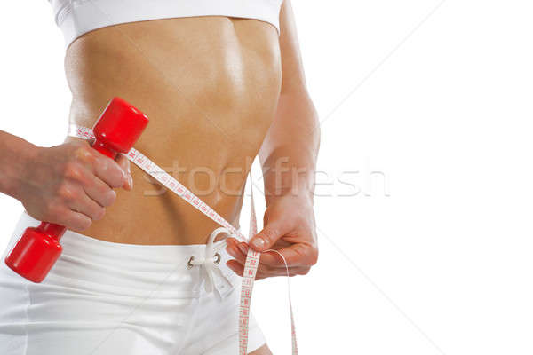 young athletic woman measuring waist Stock photo © adam121