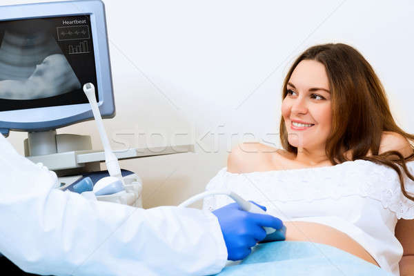 Mulher grávida recepção médico jovem atraente saúde Foto stock © adam121