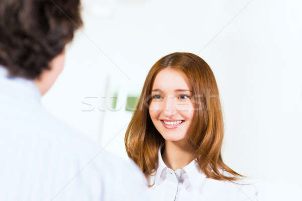 Attractive woman talking with a man Stock photo © adam121