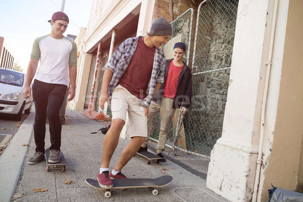 Guys skateboarders in street Stock photo © adam121