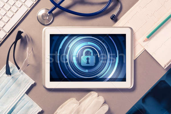 Web security and technology concept with tablet pc on table Stock photo © adam121