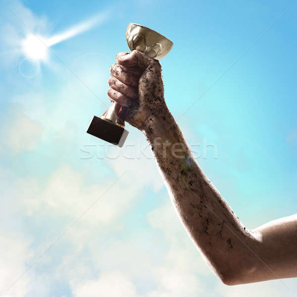 Foto stock: Ganador · mano · taza · éxito · cielo