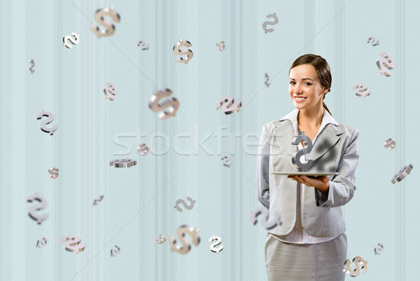 business woman smiling and holding a table Stock photo © adam121