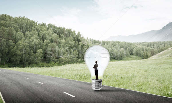 女性実業家 電球 小さな 閉じ込められた アスファルト ストックフォト © adam121