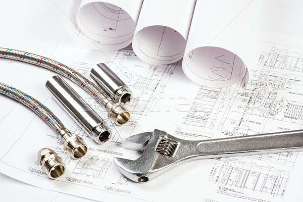 Stock photo: plumbing and drawings, construction still life