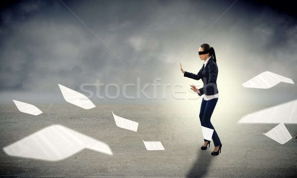 Stock photo: young blindfolded woman