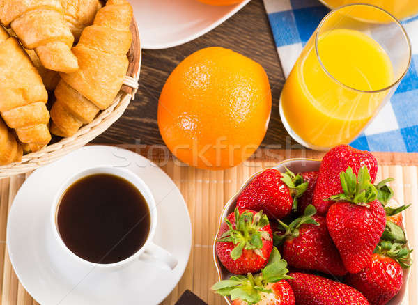 Континентальный завтрак апельсиновый сок круассаны клубники натюрморт кофе Сток-фото © adam121