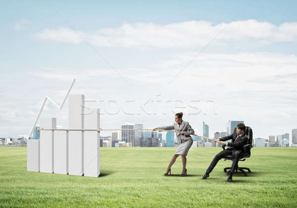 Businesspeople pulling graph with rope as symbol of power and co Stock photo © adam121