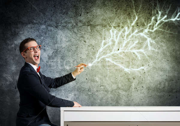 Smart guy draw on wall Stock photo © adam121
