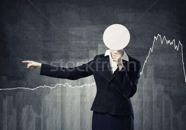 Stockfoto: Onherkenbaar · zakenvrouw · grafieken · verbergen · gezicht · achter