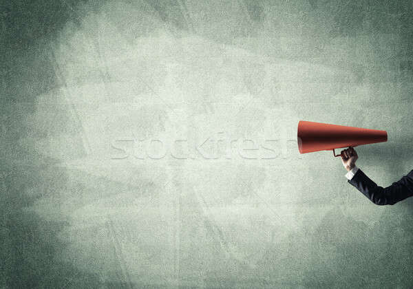 Kéz üzletasszony tart piros papír trombita Stock fotó © adam121